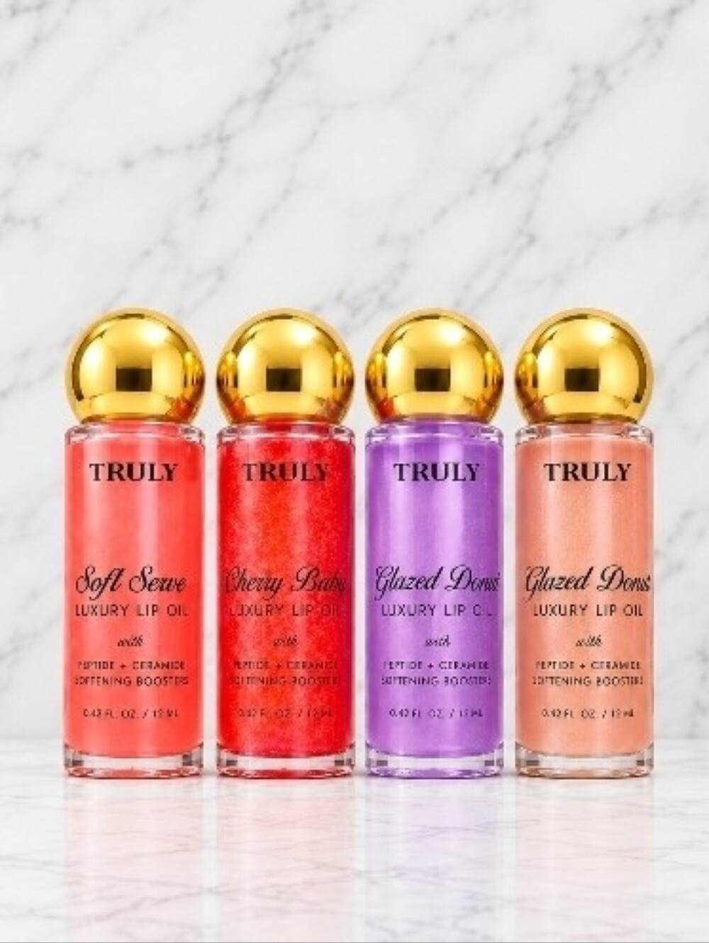 4 x Truly Luxury Lip Oils Soft Serve, Cherry Baby, Glazed Donut x 2 Sealed!